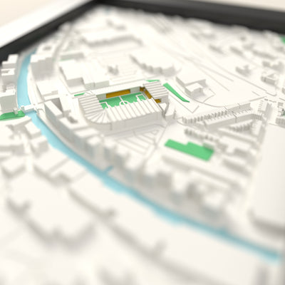 3D Carrow Road Map Framed - Close-up across the 3D map: the real Carrow Road stands with yellow seats around the green pitch