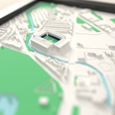 3D Hillsborough Map Framed - Close-up across the 3D map: the real Hillsborough stands with royal blue seats around the green pitch