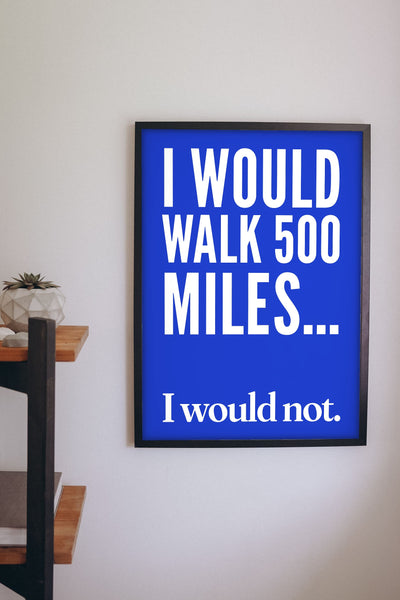 Funny 500 Miles lyric print framed on a wall