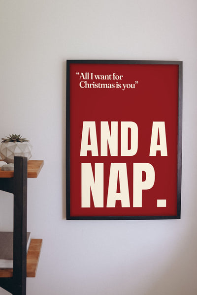 Funny All I Want for Christmas Is You lyric print framed on a wall