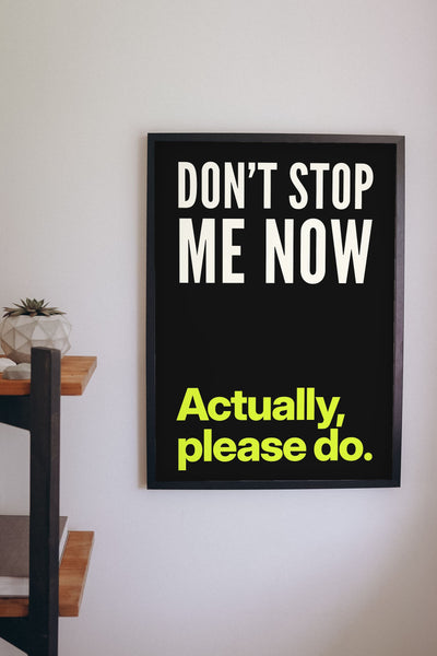 Funny Don't Stop Me Now lyric print framed on a wall