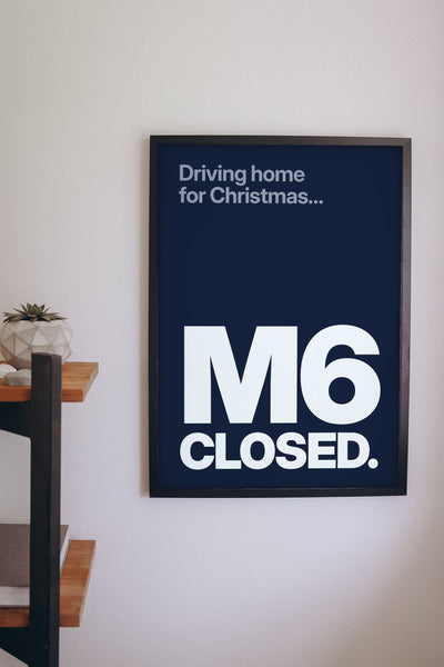 Funny Driving Home for Christmas lyric print framed on a wall