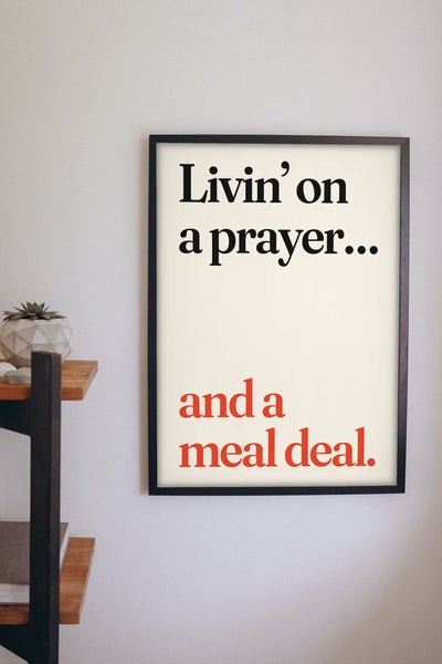 Funny Livin' on a Prayer lyric print framed on a wall