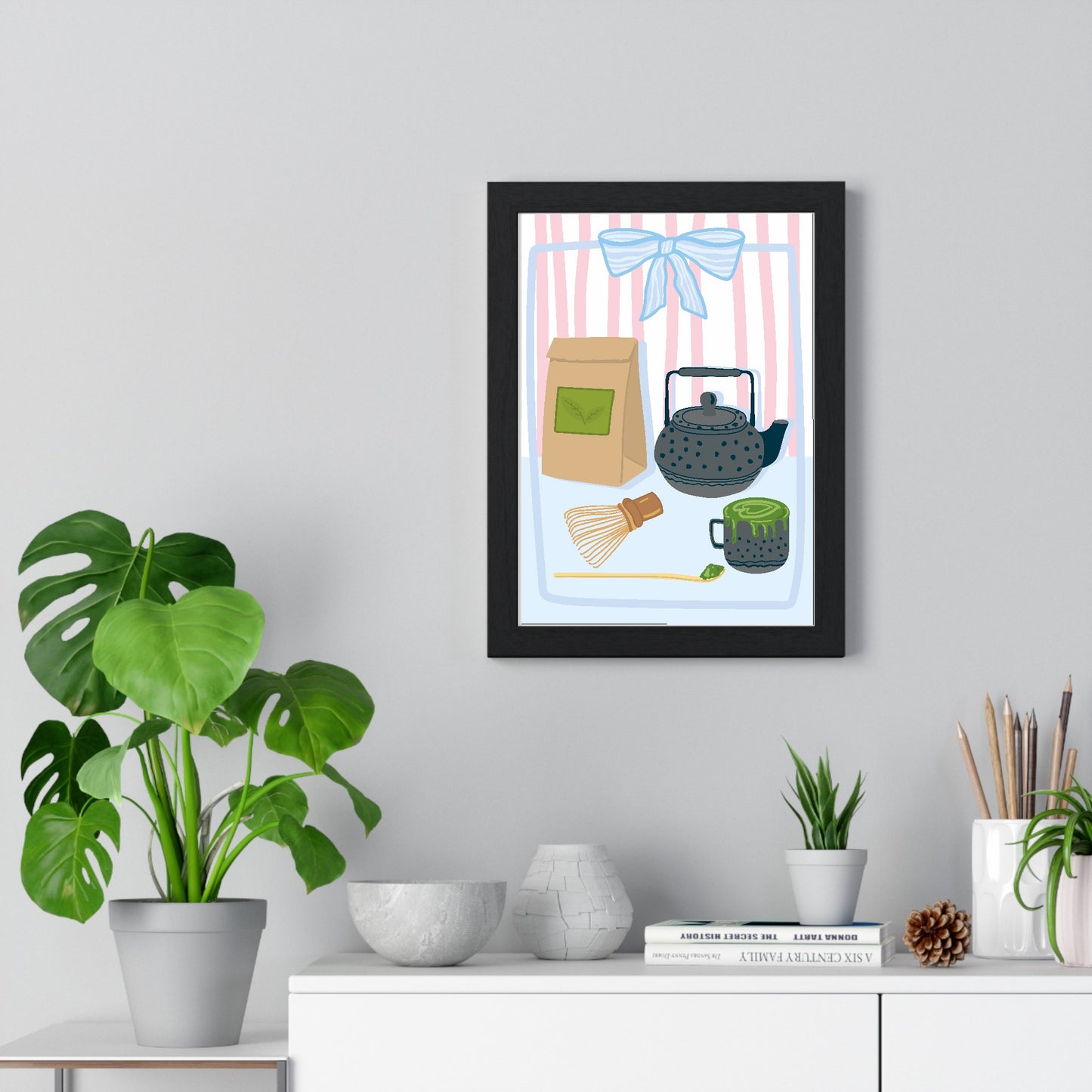 Matcha tea poster framed on living room wall above wooden furniture