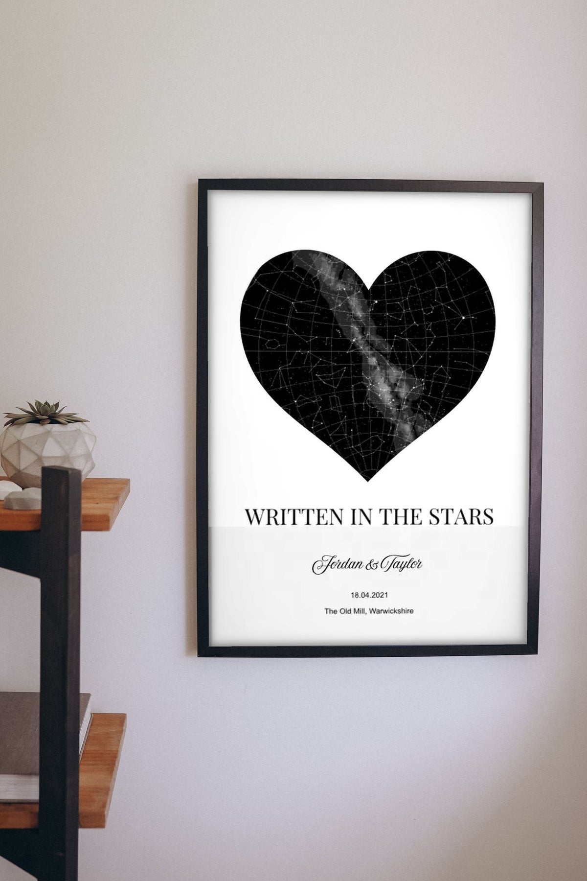 Lifestyle - Personalised Star Map Heart Print hanging on a living room wall