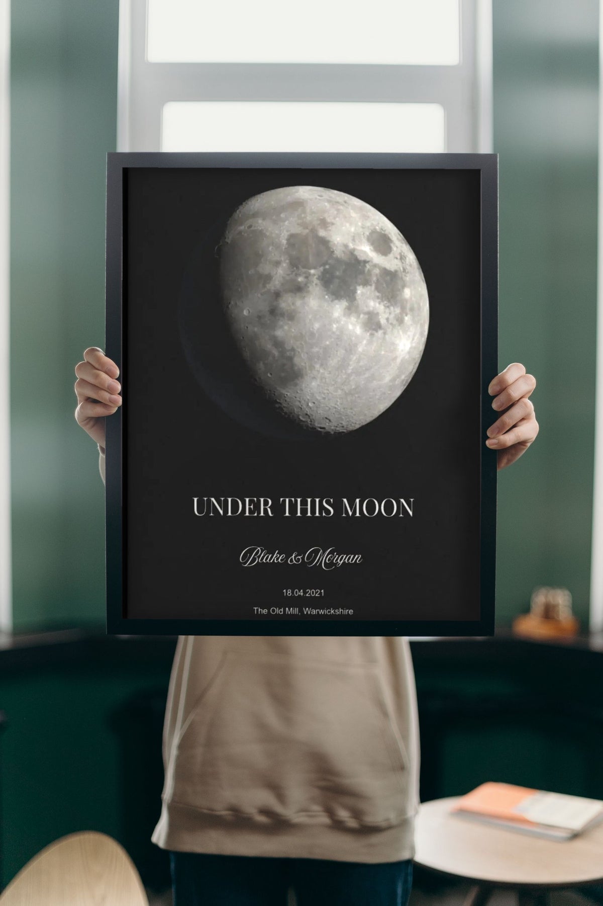 Lifestyle - Personalised Moon Phase Print held up in a bright room