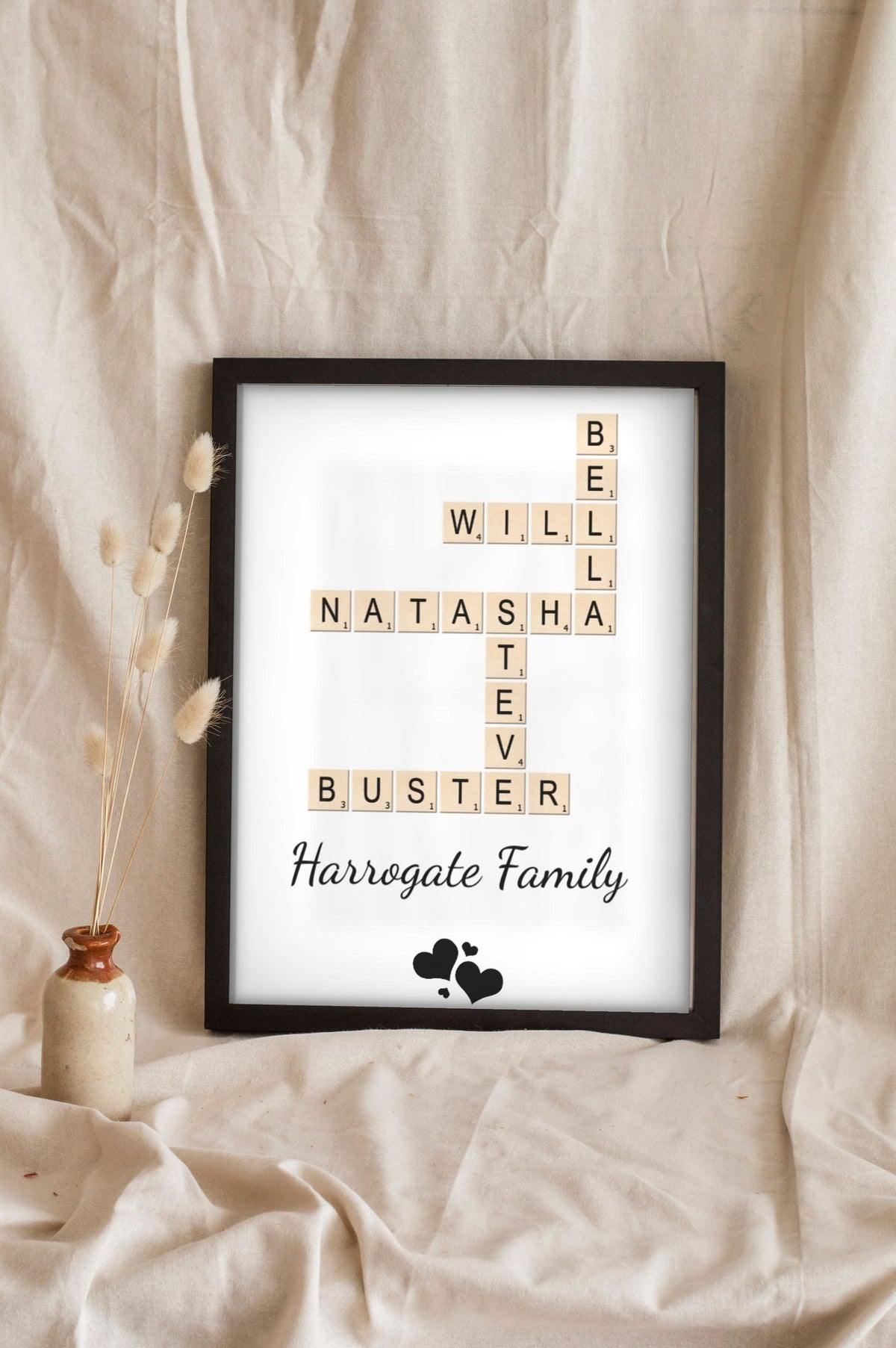 Lifestyle - Personalised Family Name Scrabble Print leaning in a frame with dried flowers