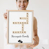Lifestyle - Personalised Family Name Scrabble Print held by a smiling woman