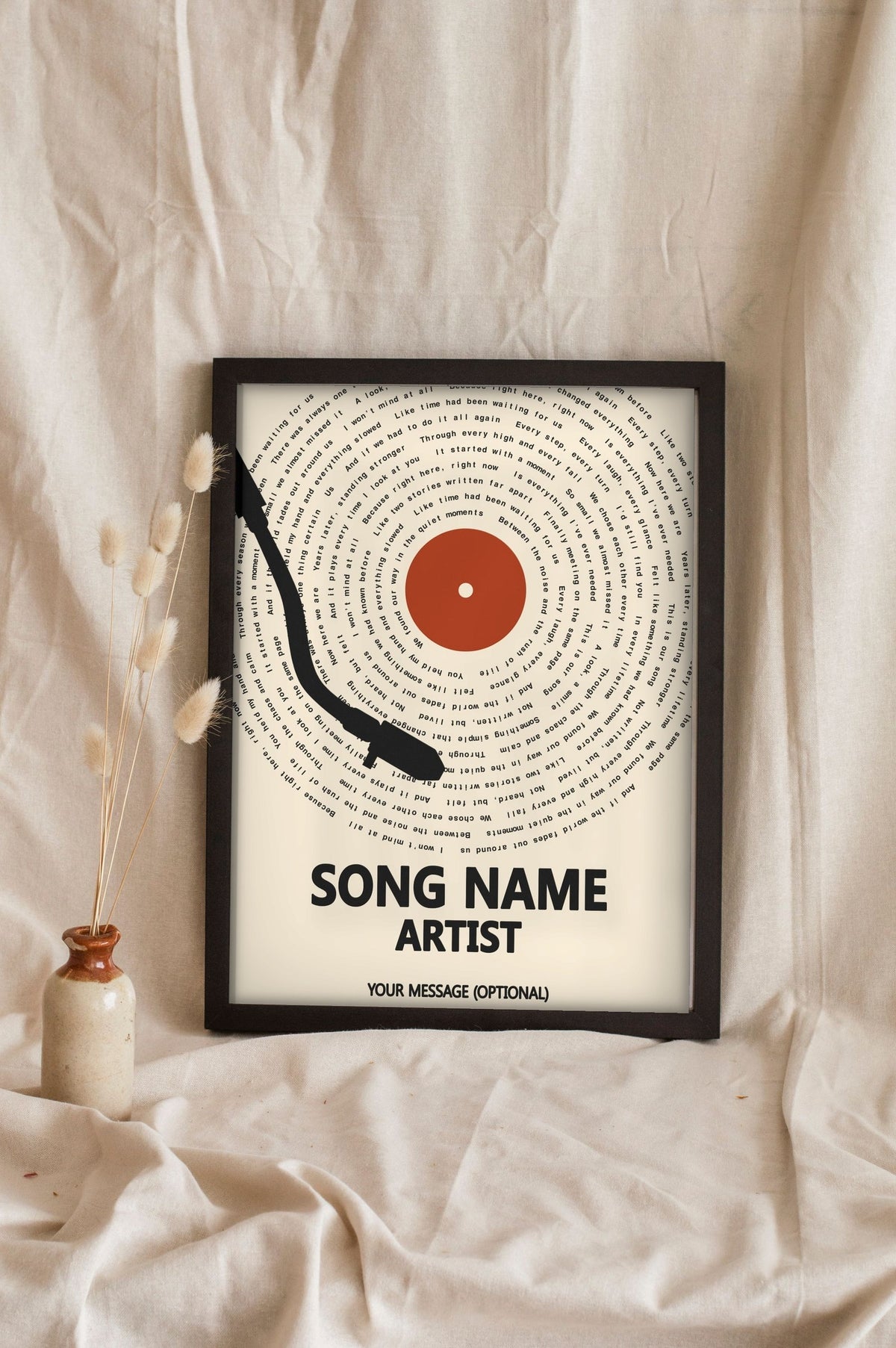 Lifestyle - Personalised Song Lyrics Vinyl Record Print leaning in a frame with dried flowers