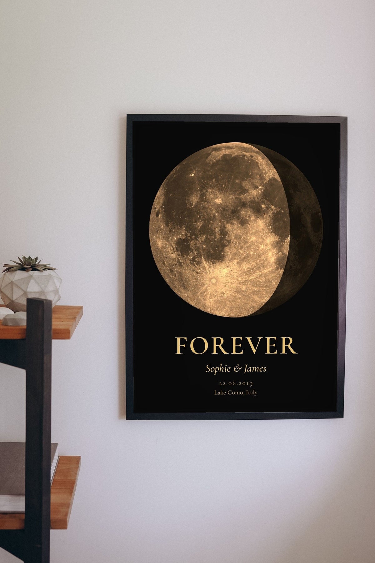 Lifestyle - Personalised Anniversary Moon Phase Print hanging on a living room wall