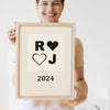 Lifestyle - Personalised Couples Anniversary Print held by a smiling woman