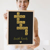 Lifestyle - Personalised Glitter Family Name Scrabble Print held by a smiling woman