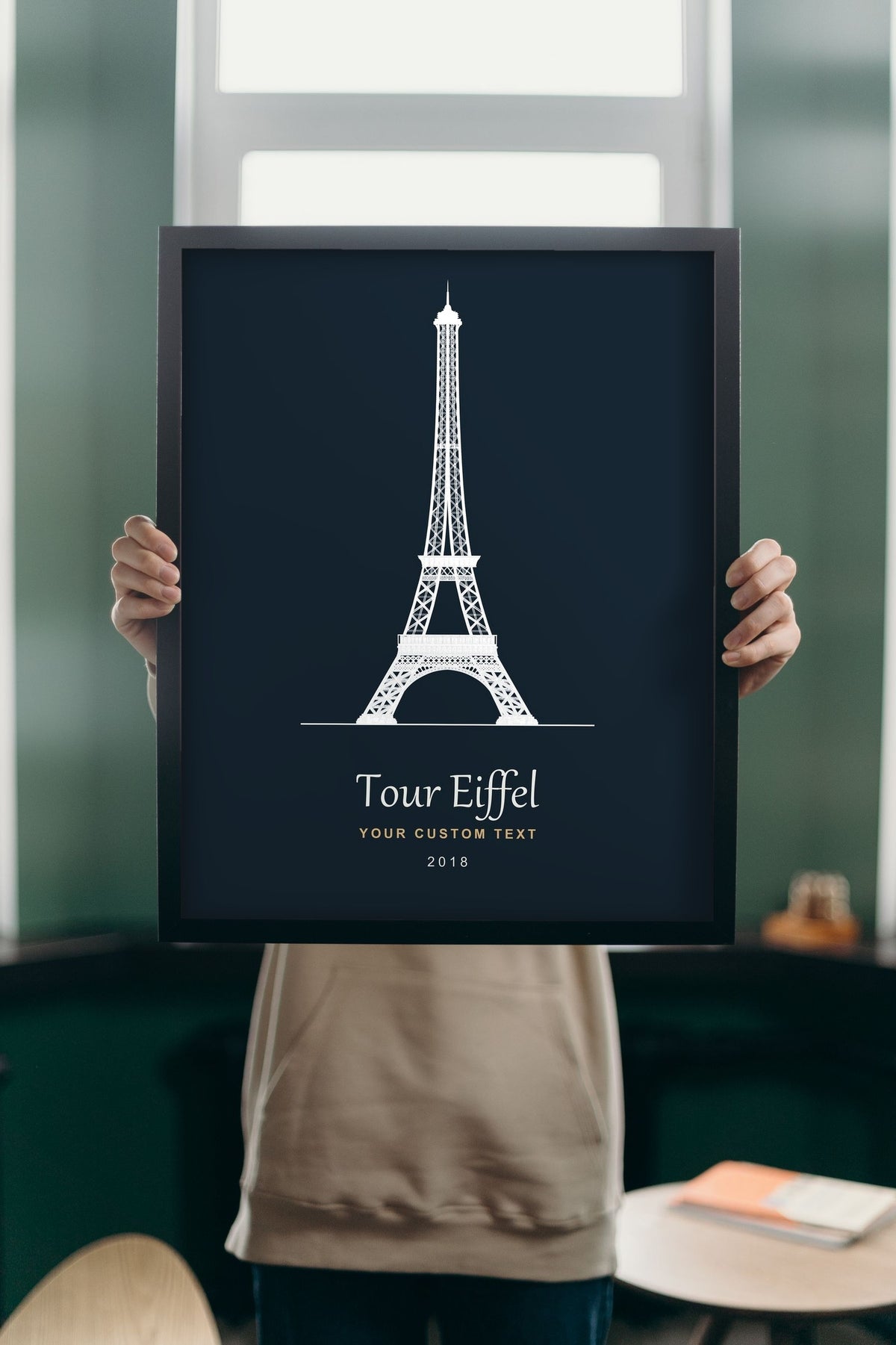 Lifestyle - Personalised Eiffel Tower Line Art Print held up in a bright room