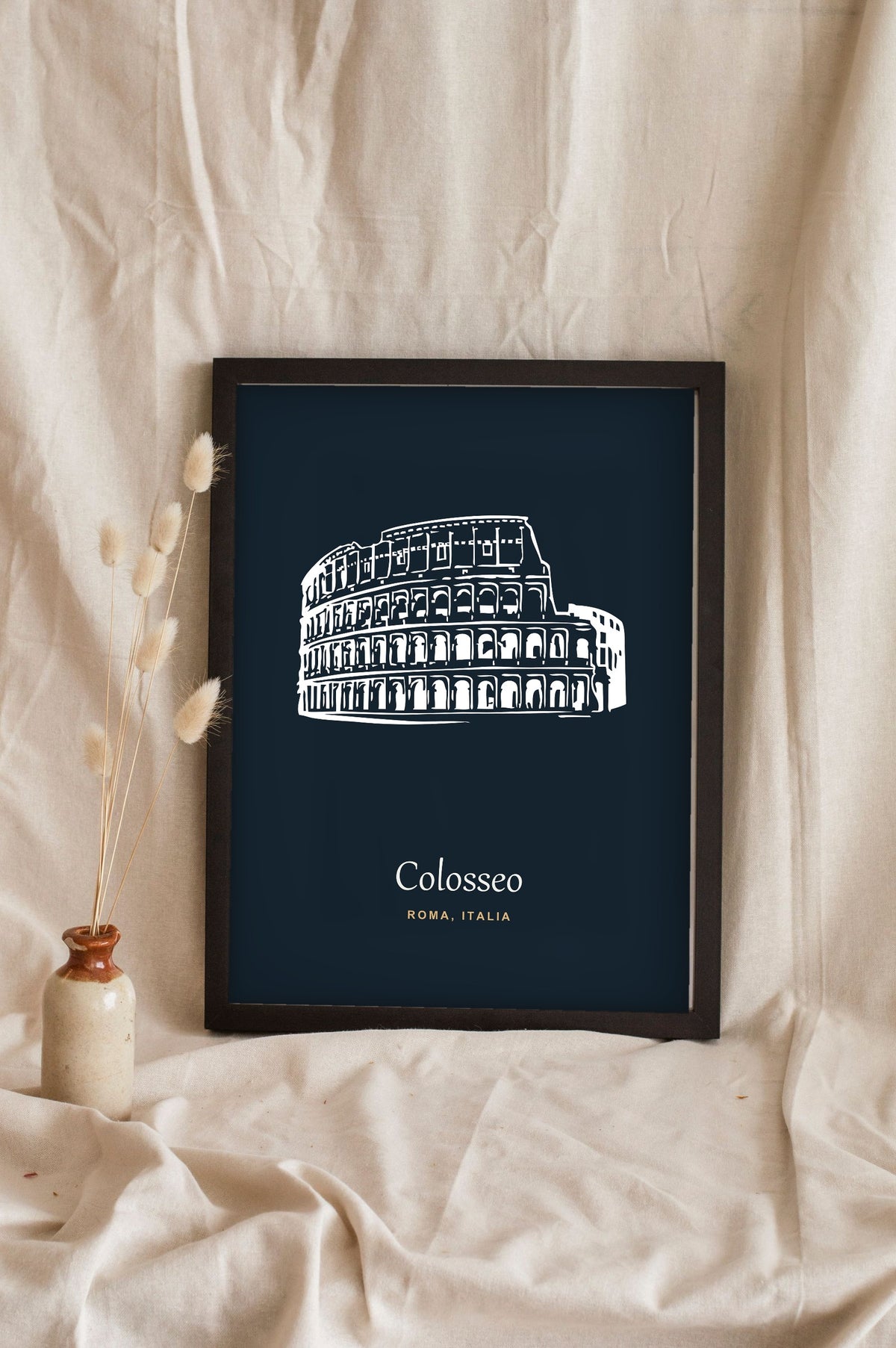 Lifestyle - Personalised Colosseum Line Art Print leaning in a frame with dried flowers