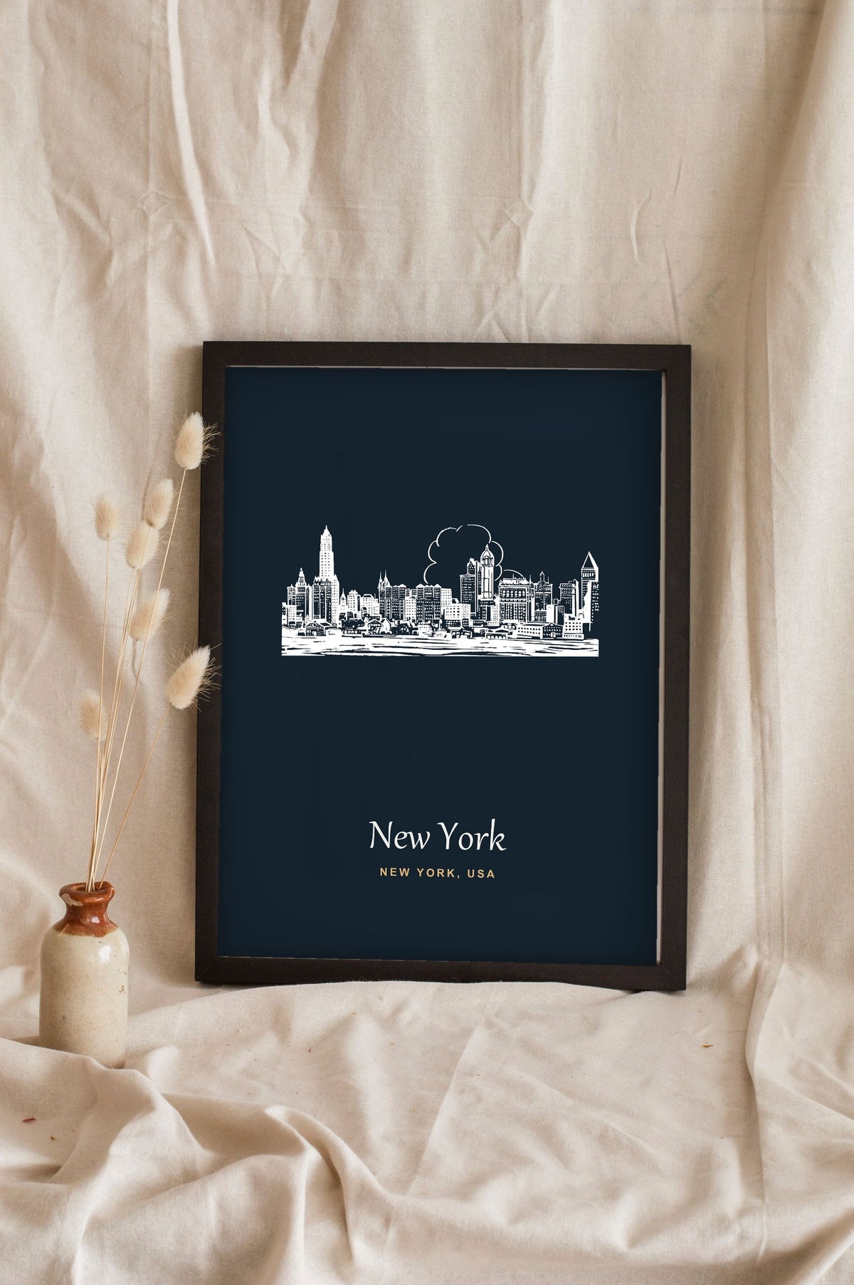 Lifestyle - Personalised New York Line Art Print leaning in a frame with dried flowers
