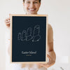 Lifestyle - Personalised Easter Island Line Art Print held by a smiling woman