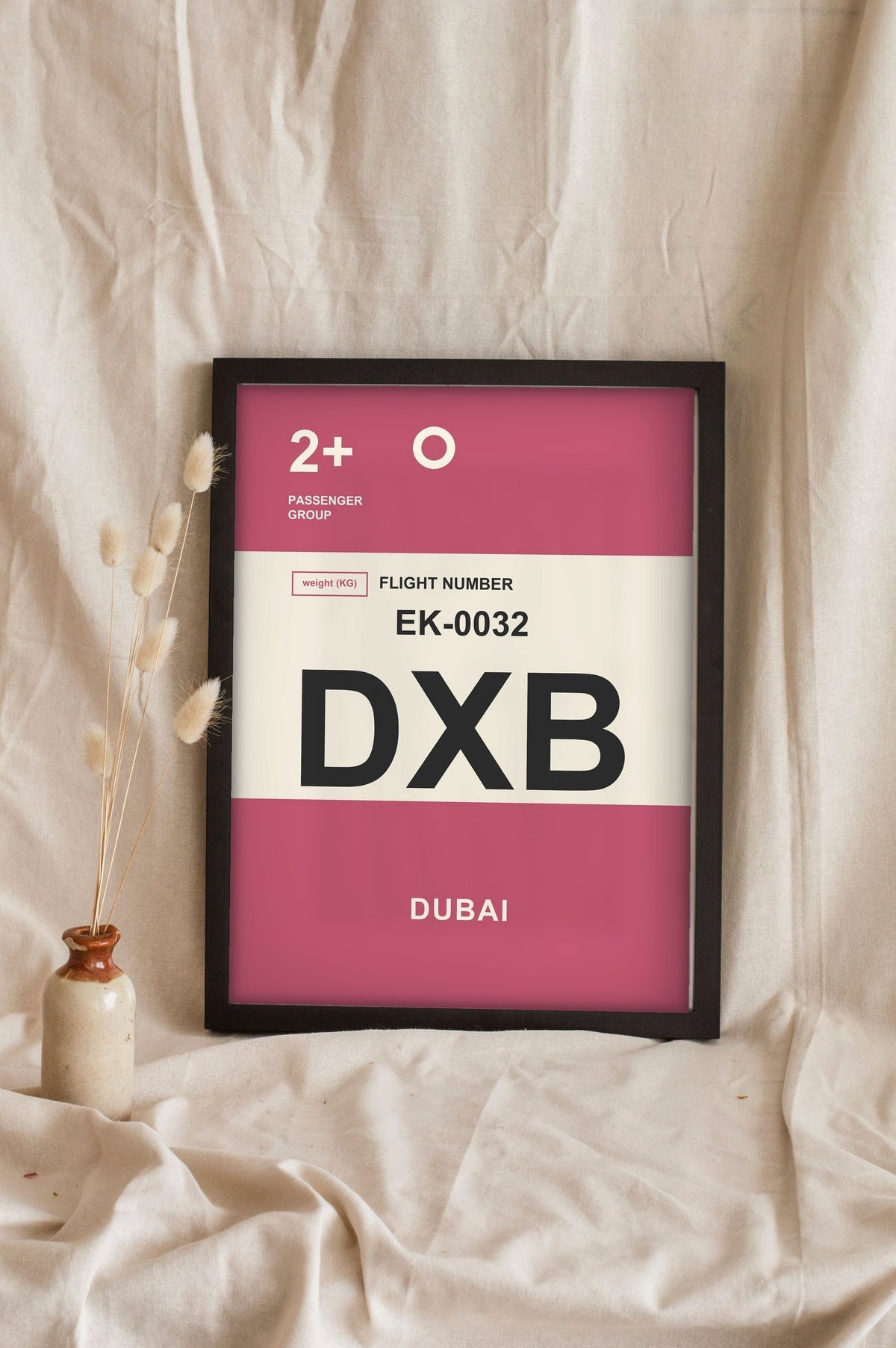 Lifestyle - Personalised Boarding Pass Print leaning in a frame with dried flowers