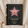 Lifestyle - Personalised Walk of Fame Star Print leaning in a frame with dried flowers