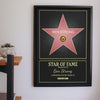 Lifestyle - Personalised Walk of Fame Star Print hanging on a living room wall