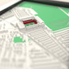 3D Anfield Map Framed - Close-up across the 3D map: the real Anfield stands with red seats around the green pitch