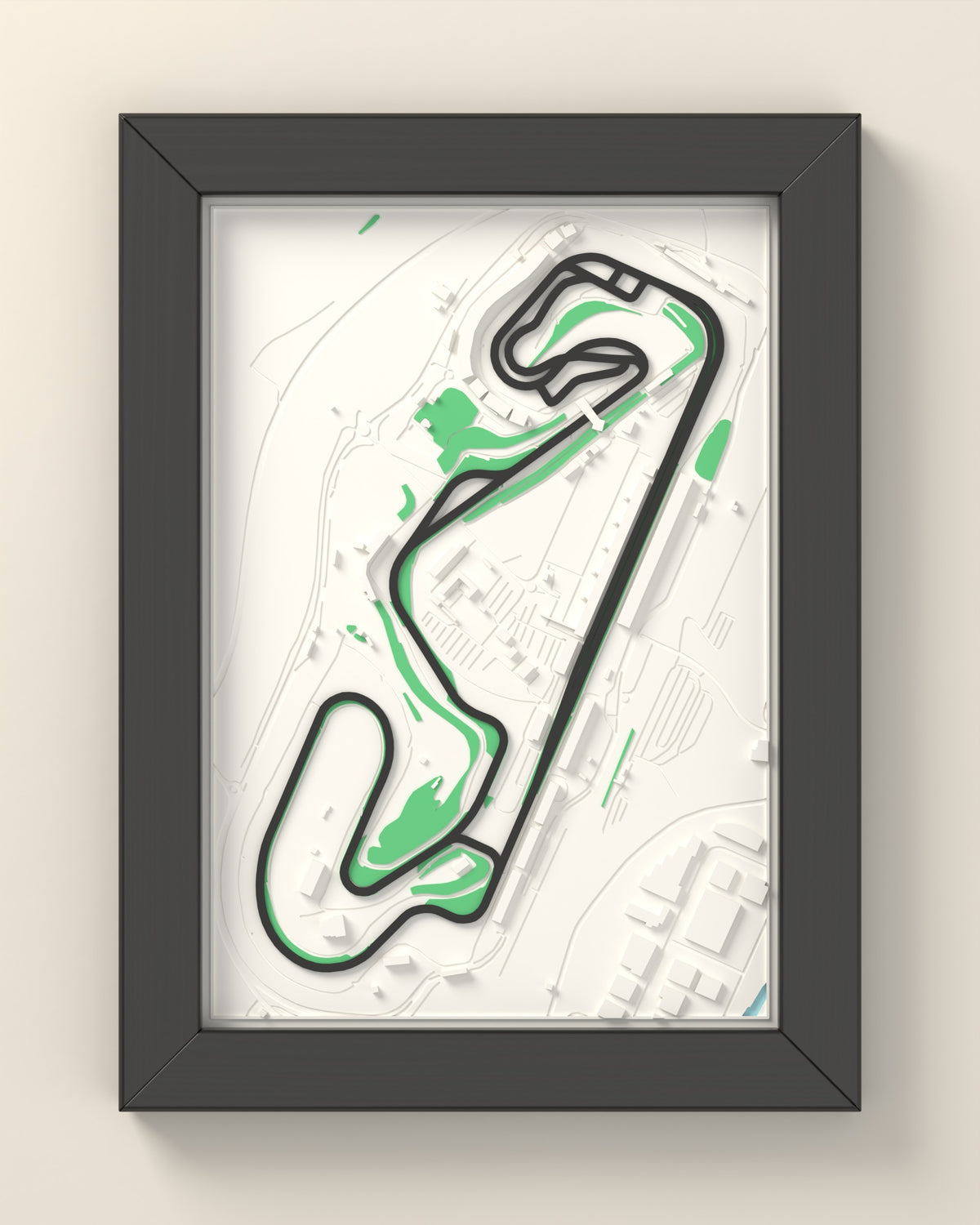 3D Barcelona-Catalunya Circuit Map Framed - 3D printed Barcelona-Catalunya Circuit map in a black wooden A5 frame, the track raised in dark grey