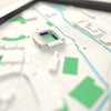 3D Brick Community Stadium Map Framed - Close-up across the 3D map: the real Brick Community Stadium stands with royal blue seats around the green pitch