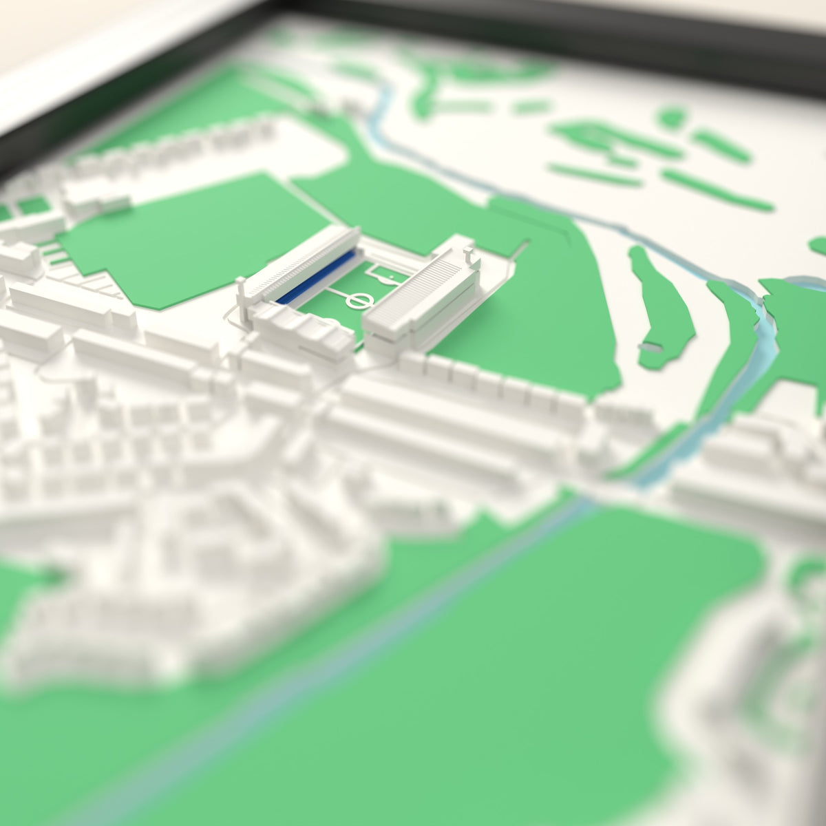 3D Brunton Park Map Framed - Close-up across the 3D map: the real Brunton Park stands with royal blue seats around the green pitch