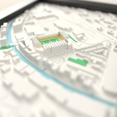 3D Carrow Road Map Framed - Close-up across the 3D map: the real Carrow Road stands with yellow seats around the green pitch