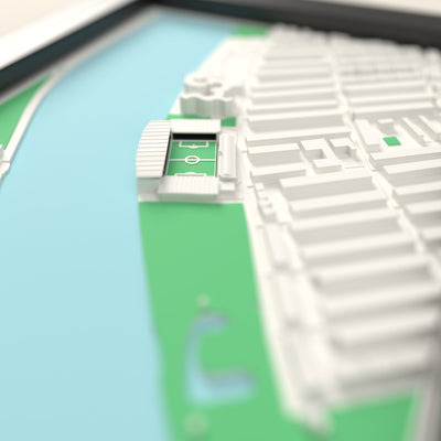 3D Craven Cottage Map Framed - Close-up across the 3D map: the real Craven Cottage stands with black seats around the green pitch