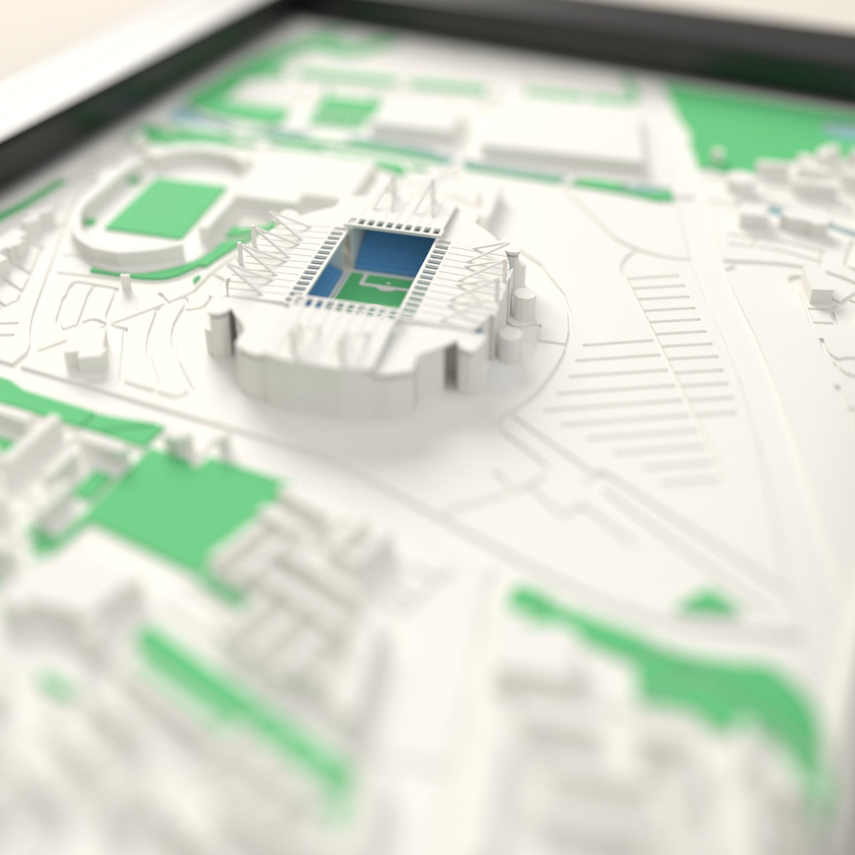 3D Etihad Stadium Map Framed - Close-up across the 3D map showing the Etihad Stadium stands and green pitch standing up from the streets