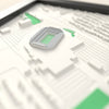 3D Lambeau Field Map Framed - Close-up across the 3D map: the real Lambeau Field stands with silver seats around the green pitch