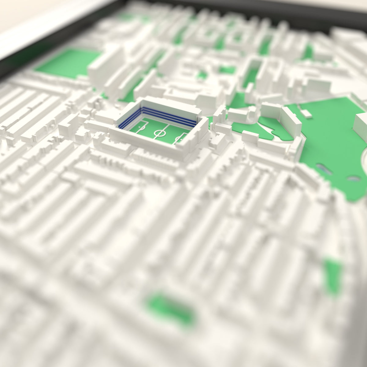 3D Loftus Road Map Framed - Close-up across the 3D map: the real Loftus Road stands with royal blue seats around the green pitch