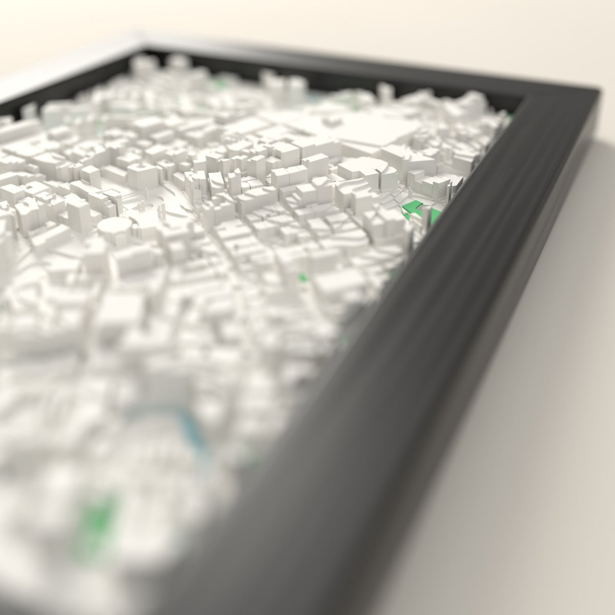 3D Manchester Map Framed - Close-up across the 3D Manchester map showing the raised streets and buildings