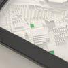3D Old Trafford Map Framed - Close-up of the raised streets and buildings around Old Trafford on the 3D printed map