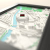 3D Principality Stadium Map Framed - Close-up across the 3D map: the real Principality Stadium stands with red seats around the green pitch