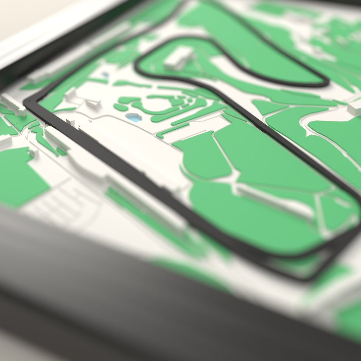 3D Red Bull Ring Map Framed - Close-up across the 3D map: the Red Bull Ring track standing up from the map