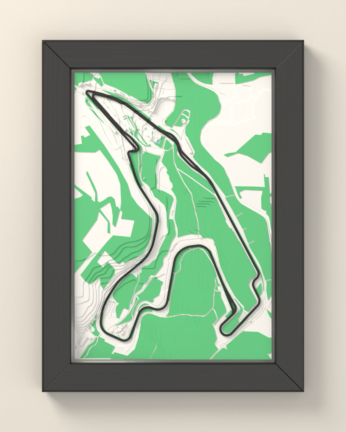3D Spa-Francorchamps Circuit Map Framed - 3D printed Spa-Francorchamps Circuit map in a black wooden A5 frame, the track raised in dark grey