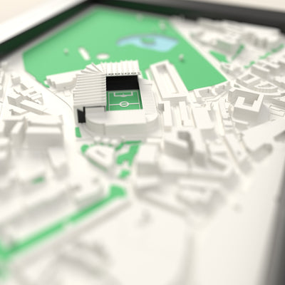 3D St James' Park Map Framed - Close-up across the 3D map: the real St James' Park stands with black seats around the green pitch