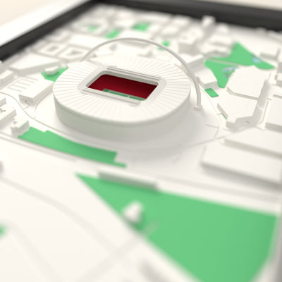 3D Wembley Stadium Map Framed - Close-up across the 3D map: the real Wembley Stadium stands with red seats around the green pitch