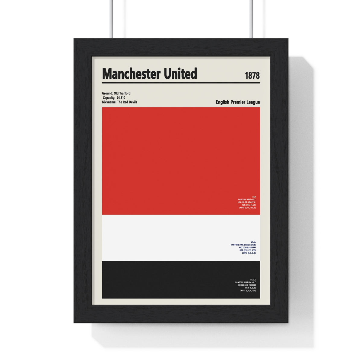 Manchester United colour swatch print in a black frame with red, white and black club colours and Old Trafford details