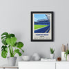 Chelsea Stamford Bridge stadium print framed in black on a living room wall above a sideboard with a monstera plant, showing the blue seats, green pitch and Stamford Bridge stand, London