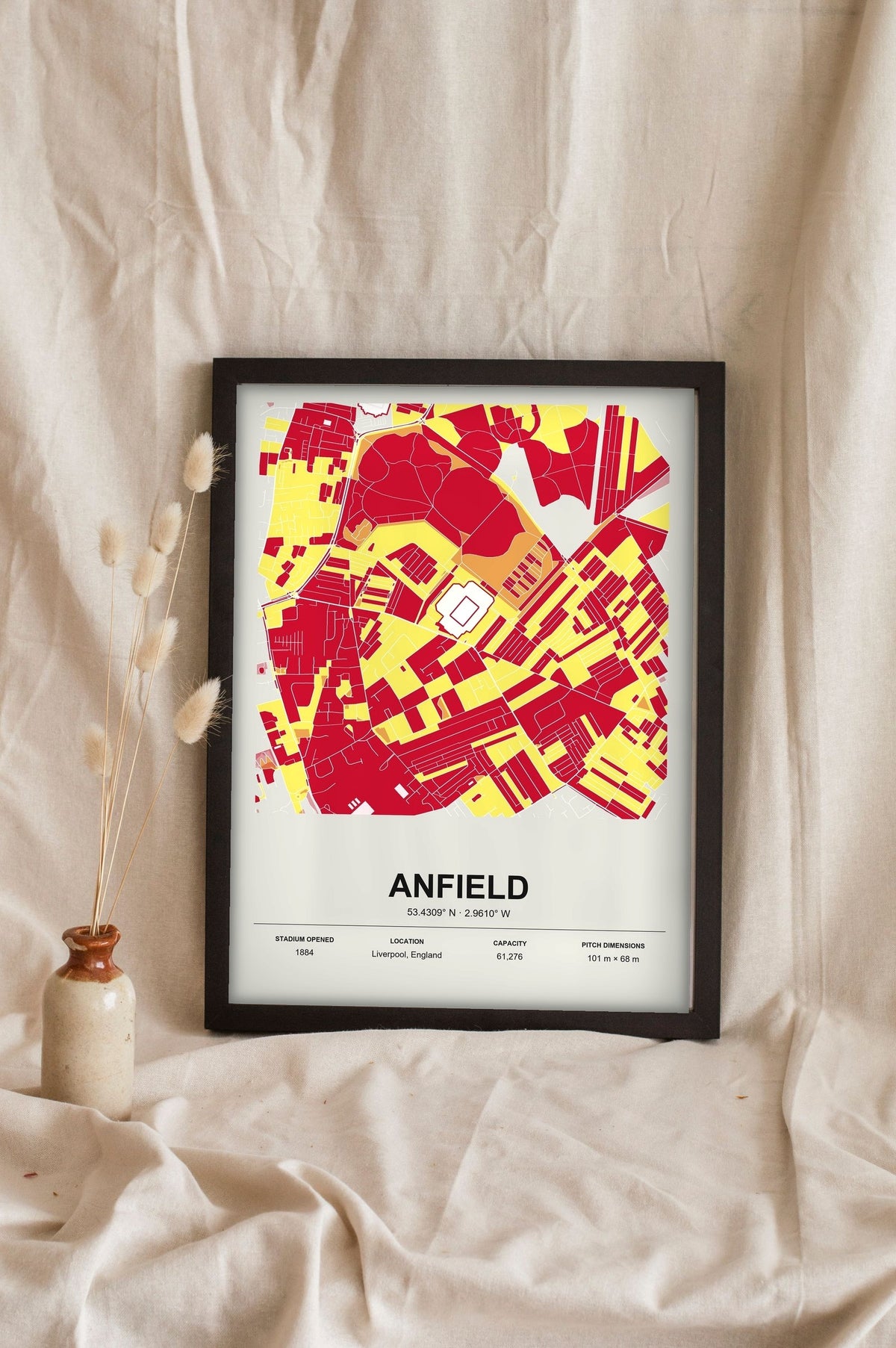 Lifestyle - Personalised Stadium Map Print leaning in a frame with dried flowers