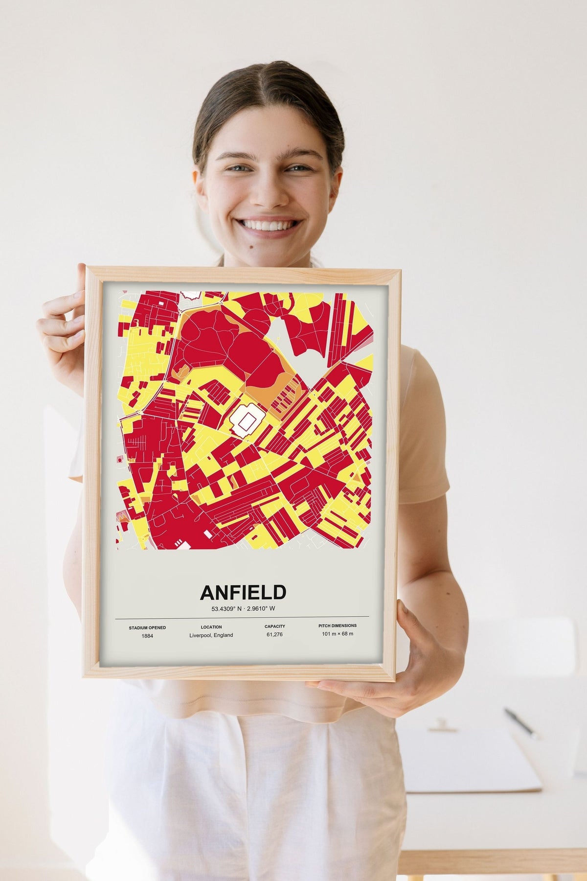 Lifestyle - Personalised Stadium Map Print held by a smiling woman