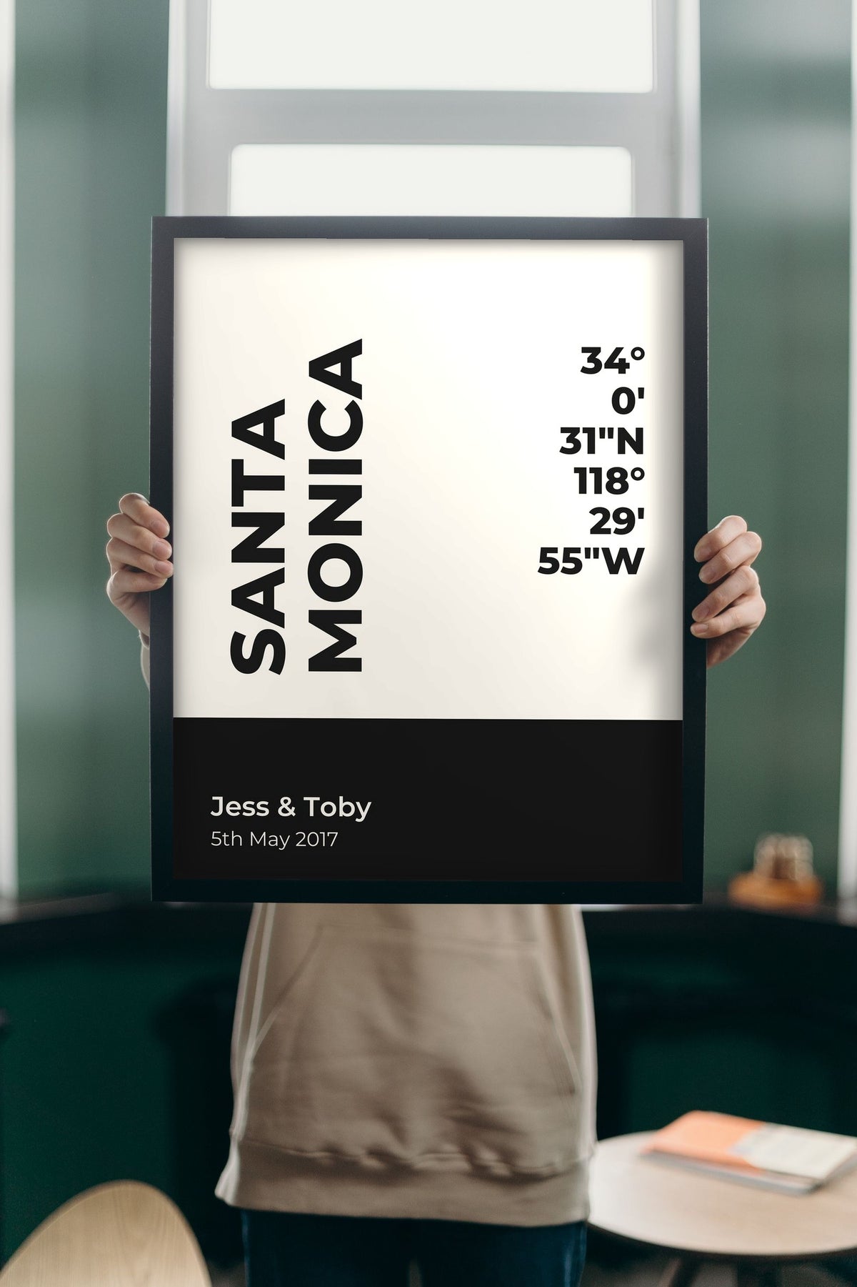 Lifestyle - Personalised Coordinates Print held up in a bright room