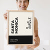 Lifestyle - Personalised Coordinates Print held by a smiling woman