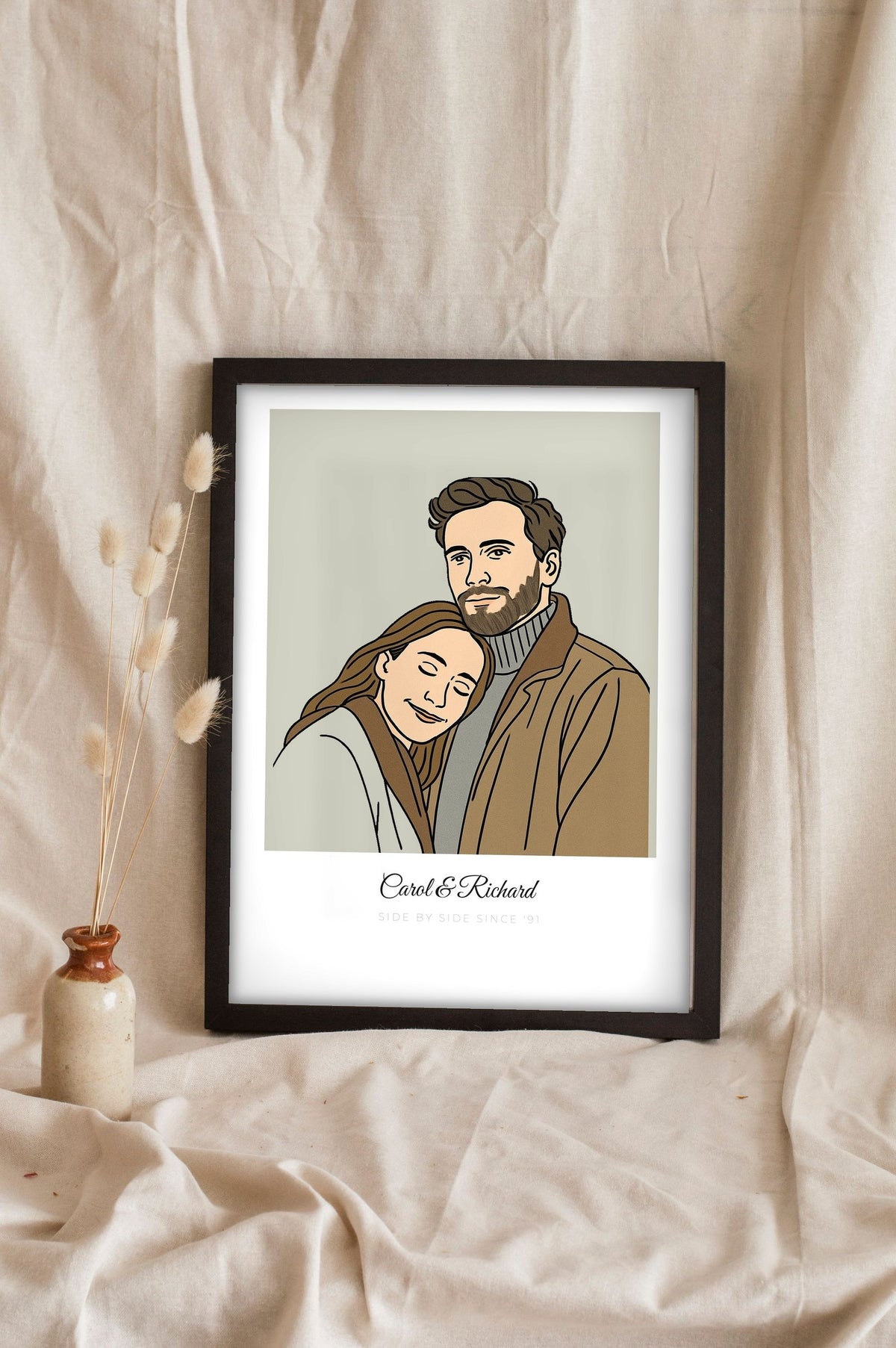 Lifestyle - Personalised Couples Line Portrait Print leaning in a frame with dried flowers