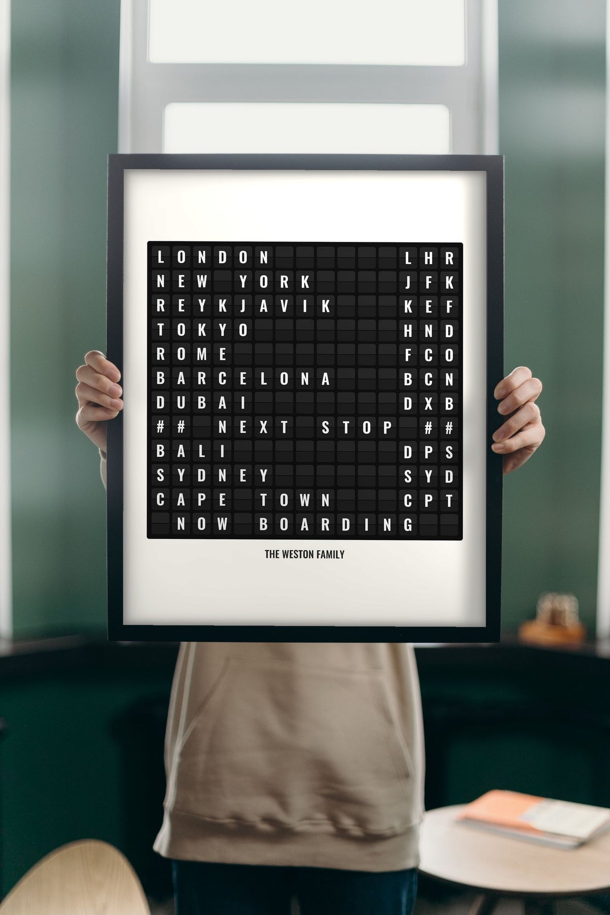 Lifestyle - Personalised Airport Destination Board Print held up in a bright room