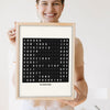 Lifestyle - Personalised Airport Destination Board Print held by a smiling woman