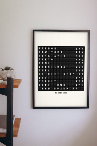 Lifestyle - Personalised Airport Destination Board Print hanging on a living room wall