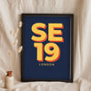 Lifestyle - Personalised Postcode Print leaning in a frame with dried flowers